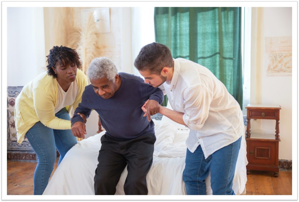Helping man up from bed